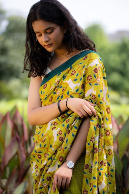 Shop Thee Modern Roots Green Crepe Animal Print Saree With Unstitched Blouse Piece at Aza Fashions Shop_Thee Modern Roots_Green Crepe Animal Print Saree With Unstitched Blouse Piece _at_Aza_Fashions