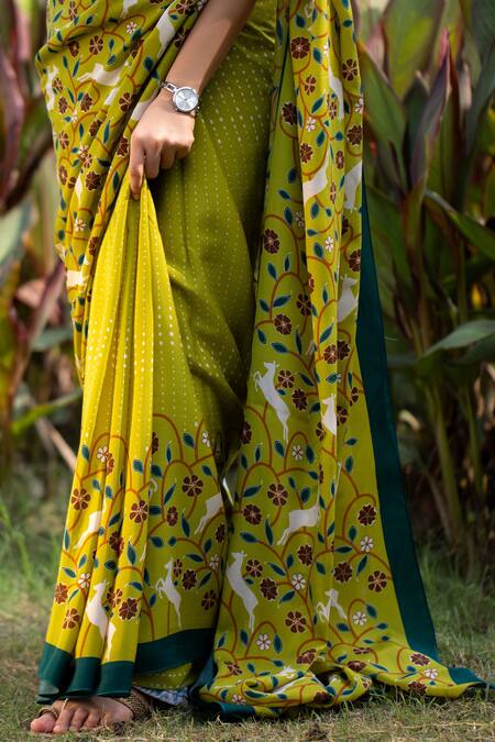 Thee Modern Roots Green Crepe Animal Print Saree With Unstitched Blouse Piece at Aza Fashions Thee Modern Roots_Green Crepe Animal Print Saree With Unstitched Blouse Piece _at_Aza_Fashions