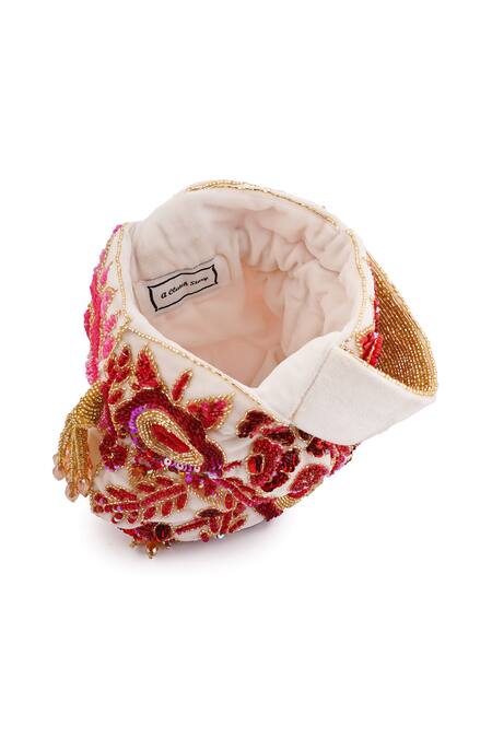 Shop A Clutch Story Pink Cut Work, Sequins, Beads Rosy Dream Floral Embroidered Potli Online at Aza Fashions Shop_A Clutch Story_Pink Cut Work, Sequins, Beads Rosy Dream Floral Embroidered Potli _Online_at_Aza_Fashions