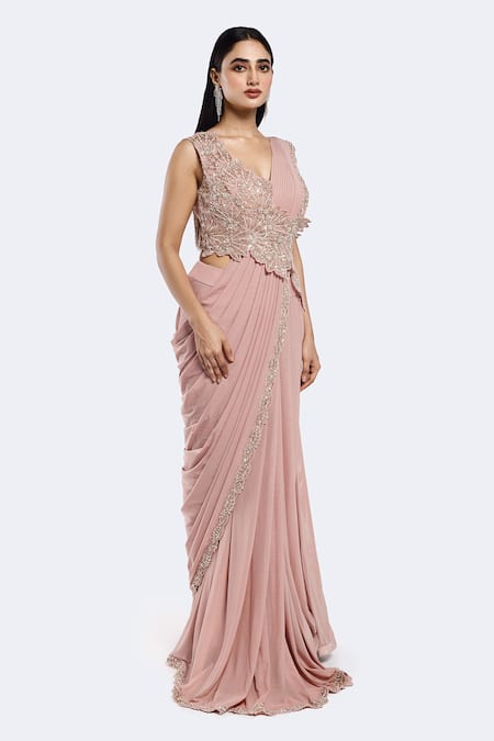 Onaya Pink Lycra Cut Work, Sequins Leaf Embellished Hem Pre-draped Saree With Blouse Online at Aza Fashions Onaya_Pink Lycra Cut Work, Sequins Leaf Embellished Hem Pre-draped Saree With Blouse _Online_at_Aza_Fashions