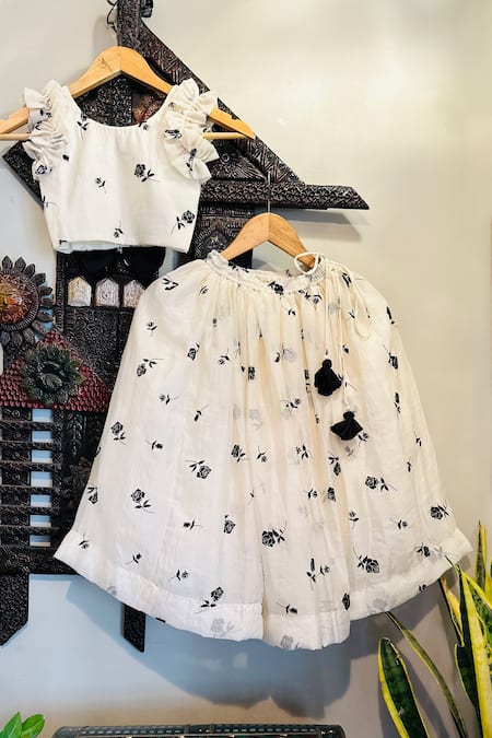 Shop Rage Attire-Sweta Saria Ivory Organza Bows Rose Embossed Lehenga With Blouse at Aza Fashions Shop_Rage Attire-Sweta Saria_Ivory Organza Bows Rose Embossed Lehenga With Blouse _at_Aza_Fashions