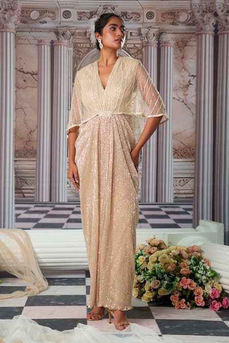 Buy Nidhika Shekhar Beige Net Sequins, Beads V-neck Aphrodite Shimmer Cape Gown Online at Aza Fashions Buy_Nidhika Shekhar_Beige Net Sequins, Beads V-neck Aphrodite Shimmer Cape Gown _Online_at_Aza_Fashions