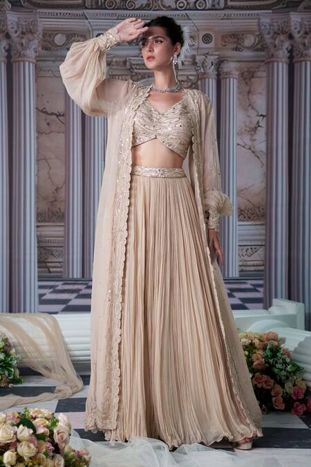 Buy Nidhika Shekhar Beige Silk, Organza, Georgette Sequins, Venus Embroidered Cape And Lehenga Set Online at Aza Fashions Buy_Nidhika Shekhar_Beige Silk, Organza, Georgette Sequins, Venus Embroidered Cape And Lehenga Set _Online_at_Aza_Fashions
