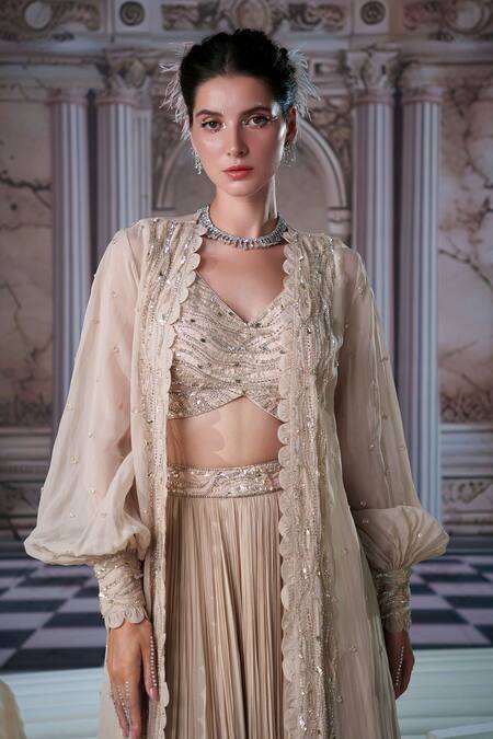 Nidhika Shekhar Beige Silk, Organza, Georgette Sequins, Venus Embroidered Cape And Lehenga Set at Aza Fashions Nidhika Shekhar_Beige Silk, Organza, Georgette Sequins, Venus Embroidered Cape And Lehenga Set _at_Aza_Fashions