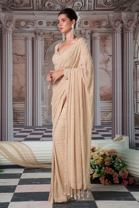 Nidhika Shekhar_Gold Georgette, Silk Sequins, Celestial Embroidered Pre-draped Saree With Blouse _Online_at_Aza_Fashions