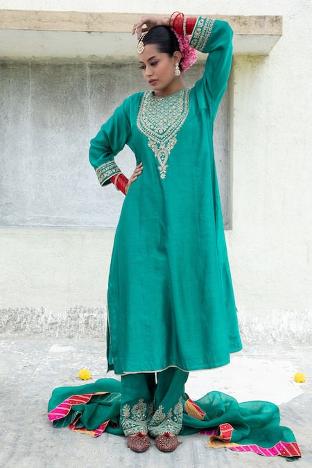 Shop Pants And Pajamas Green Cotton Flower Embroidered Hem Pant at Aza Fashions Shop_Pants And Pajamas_Green Cotton Flower Embroidered Hem Pant _at_Aza_Fashions