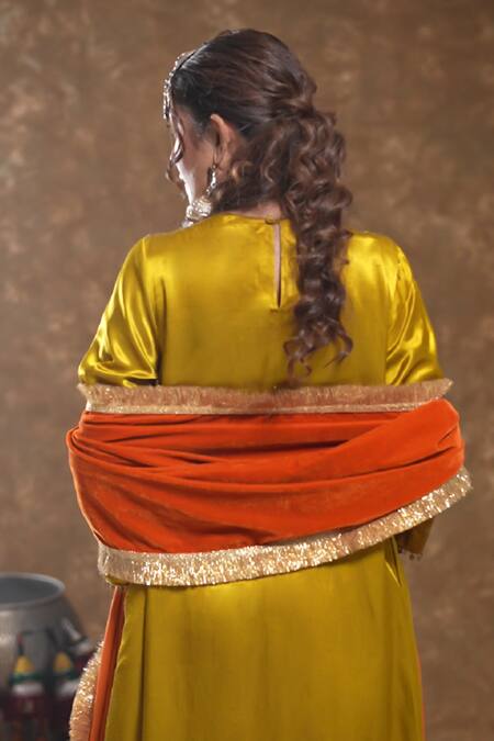 Shop Ekavira Yellow Silk Embroidery Round Neck Shaira Tribal Kurta And Palazzo Set at Aza Fashions Shop_Ekavira_Yellow Silk Embroidery Round Neck Shaira Tribal Kurta And Palazzo Set_at_Aza_Fashions