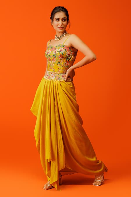 Rishi And Soujit_Yellow Silk Embroidery, Tassels Sweetheart Neck Thread Bustier And Skirt Set _Online_at_Aza_Fashions