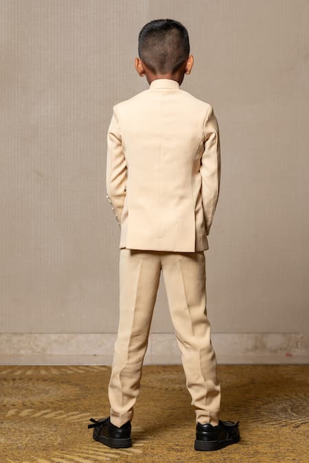 Shop Kirti Agarwal - Pret N Couture Yellow Silk Cut Work, Pearls Cutdana Embellished Bandhgala And Pant Set at Aza Fashions Shop_Kirti Agarwal - Pret N Couture_Yellow Silk Cut Work, Pearls Cutdana Embellished Bandhgala And Pant Set _at_Aza_Fashions