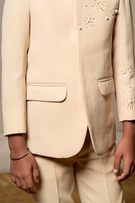 Kirti Agarwal - Pret N Couture Yellow Silk Cut Work, Pearls Cutdana Embellished Bandhgala And Pant Set at Aza Fashions Kirti Agarwal - Pret N Couture_Yellow Silk Cut Work, Pearls Cutdana Embellished Bandhgala And Pant Set _at_Aza_Fashions