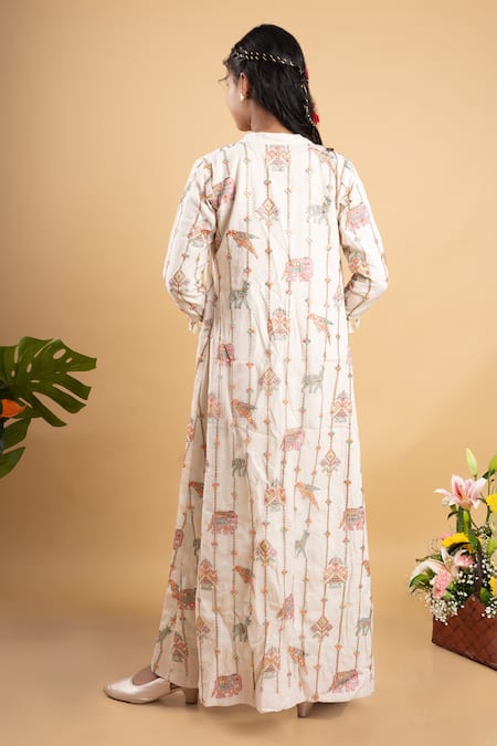 Shop Kirti Agarwal - Pret N Couture Off White Cotton Tassels, Mirrors, Embroidery Elephant Cape Pant Set at Aza Fashions Shop_Kirti Agarwal - Pret N Couture_Off White Cotton Tassels, Mirrors, Embroidery Elephant Cape Pant Set _at_Aza_Fashions