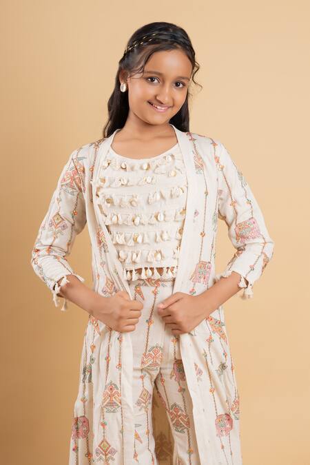 Kirti Agarwal - Pret N Couture Off White Cotton Tassels, Mirrors, Embroidery Elephant Cape Pant Set Online at Aza Fashions Kirti Agarwal - Pret N Couture_Off White Cotton Tassels, Mirrors, Embroidery Elephant Cape Pant Set _Online_at_Aza_Fashions