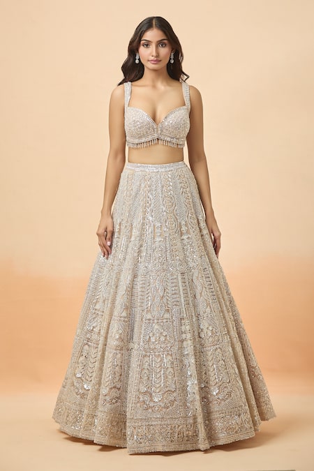 Seema Gujral_Peach Net Stones, Sequins, Embroidery Sweetheart Neck Bridal Lehenga Set _Online_at_Aza_Fashions