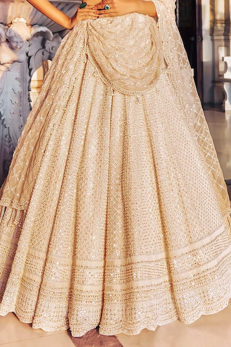 Buy Seema Gujral Ivory Organza Tassels, Pearls, Crystals, Beads Embroidered Bridal Lehenga Set Online at Aza Fashions Buy_Seema Gujral_Ivory Organza Tassels, Pearls, Crystals, Beads Embroidered Bridal Lehenga Set _Online_at_Aza_Fashions