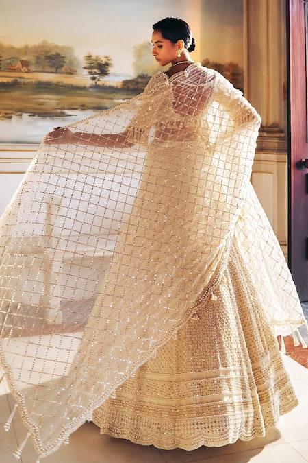 Seema Gujral Ivory Organza Tassels, Pearls, Crystals, Beads Embroidered Bridal Lehenga Set at Aza Fashions Seema Gujral_Ivory Organza Tassels, Pearls, Crystals, Beads Embroidered Bridal Lehenga Set _at_Aza_Fashions