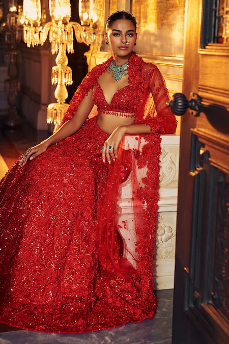 Seema Gujral Red Net Sequins, Crystals Plunge Neck 3d Floral Embroidered Bridal Lehenga Set at Aza Fashions Seema Gujral_Red Net Sequins, Crystals Plunge Neck 3d Floral Embroidered Bridal Lehenga Set _at_Aza_Fashions