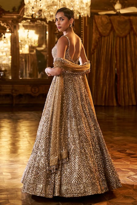 Shop Seema Gujral Gold Net Crystals, Sequins Sweetheart Geometric Embroidered Bridal Lehenga Set at Aza Fashions Shop_Seema Gujral_Gold Net Crystals, Sequins Sweetheart Geometric Embroidered Bridal Lehenga Set _at_Aza_Fashions
