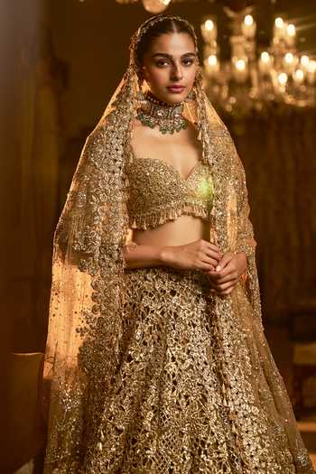Buy_Seema Gujral_Gold Net Sequins, Zari, Tassels, Embroidery Floral Cutwork Bridal Lehenga Set _Online_at_Aza_Fashions