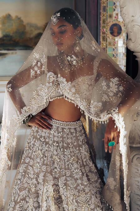 Seema Gujral_Ivory Silk, Organza Pearls Sweetheart Cutwork Embroidered Bridal Lehenga Set _at_Aza_Fashions