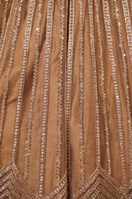 Isa By Dolly Wahal Gold Net Crystal Embellished Slit Lehenga Set at Aza Fashions Isa By Dolly Wahal_Gold Net Crystal Embellished Slit Lehenga Set _at_Aza_Fashions