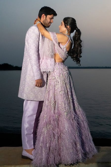 Shop_Isa By Dolly Wahal_Purple Net Feathers, Crystals, Lana Applique Embellished Bridal Lehenga Set _Online_at_Aza_Fashions