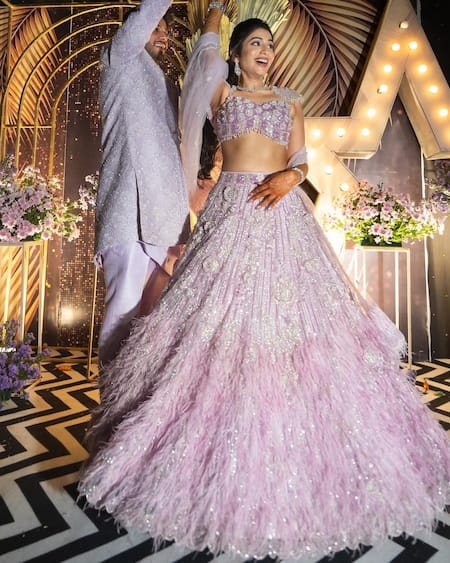 Isa By Dolly Wahal_Purple Net Feathers, Crystals, Lana Applique Embellished Bridal Lehenga Set _at_Aza_Fashions