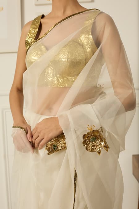 Peeli Dori Ivory Silk Organza Hand Embroidered Sequin Paro Floral Saree With Blouse at Aza Fashions Peeli Dori_Ivory Silk Organza Hand Embroidered Sequin Paro Floral Saree With Blouse _at_Aza_Fashions
