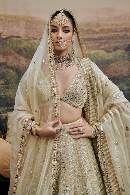 Shop Itrh Ivory Shvet Afsana Chevron Gota Patti Embroidered Mirrorwork Bridal Lehenga Set at Aza Fashions Shop_Itrh_Ivory Shvet Afsana Chevron Gota Patti Embroidered Mirrorwork Bridal Lehenga Set _at_Aza_Fashions