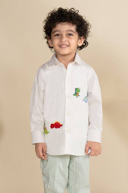 Shop Little Boys Closet White Cotton Satin Embroidery Dinasour Placement Shirt at Aza Fashions Shop_Little Boys Closet_White Cotton Satin Embroidery Dinasour Placement Shirt_at_Aza_Fashions