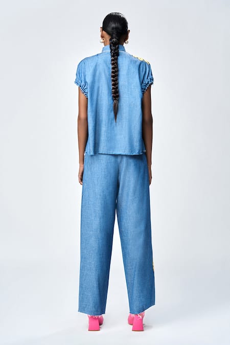 Shop Shahin Mannan Blue Denim Beads, Cut Work Shawl Neck Daisy Embroidered Shirt at Aza Fashions Shop_Shahin Mannan_Blue Denim Beads, Cut Work Shawl Neck Daisy Embroidered Shirt _at_Aza_Fashions