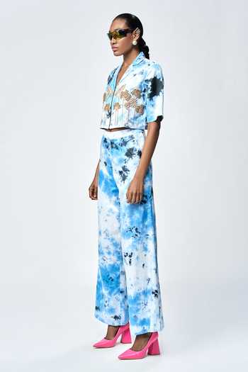 Buy Shahin Mannan Blue Silk Satin Tie-dye Pattern Flared Pant Online at Aza Fashions Buy_Shahin Mannan_Blue Silk Satin Tie-dye Pattern Flared Pant _Online_at_Aza_Fashions