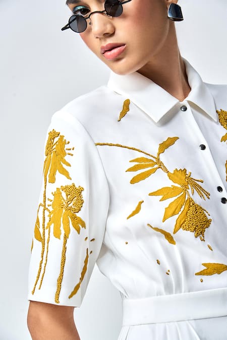 Shahin Mannan_Ivory Crepe Beads, Applique Collared Dainty Leaves Side Pleated Dress _at_Aza_Fashions