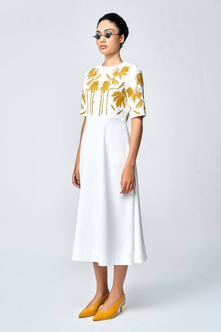 Shahin Mannan_Ivory Crepe Embroidery, Applique Round Neck Dainty Leaves A-line Dress _Online_at_Aza_Fashions