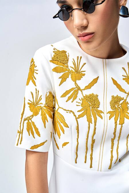 Shop_Shahin Mannan_Ivory Crepe Embroidery, Applique Round Neck Dainty Leaves A-line Dress _Online_at_Aza_Fashions