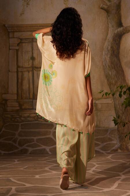 Shop Basil Leaf Off White Crepe Lace, Tassels, Floral Bird Kurta With Asymmetric Pant at Aza Fashions Shop_Basil Leaf_Off White Crepe Lace, Tassels, Floral Bird Kurta With Asymmetric Pant_at_Aza_Fashions