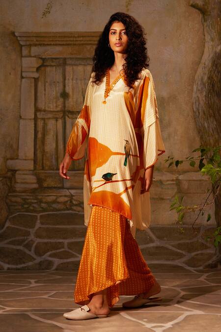 Basil Leaf Orange Crepe Sequins, Tassels V-neck Bird Print Asymmetric Kurta With Pant Online at Aza Fashions Basil Leaf_Orange Crepe Sequins, Tassels V-neck Bird Print Asymmetric Kurta With Pant_Online_at_Aza_Fashions