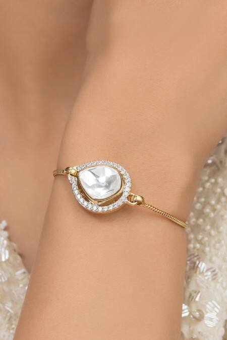 Vasundhara_Gold Plated Diamonds, Stones Rafia Tear Drop Shaped Bracelet _at_Aza_Fashions