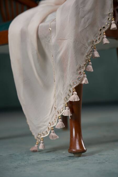 Hirika & Dhruti_Beige Silk, Chiffon, Organza Mirrors, Tassels V-neck Embroidered Lehenga Set _at_Aza_Fashions