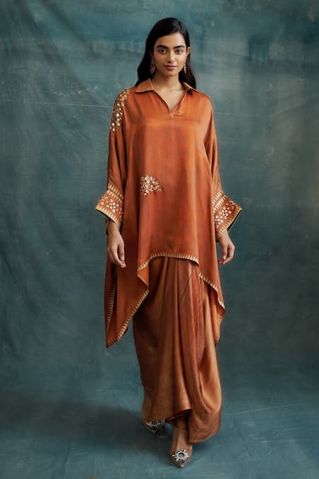 Buy_Krishna Mehta_Orange Modal Solid Asymmetric Draped Skirt _Online_at_Aza_Fashions