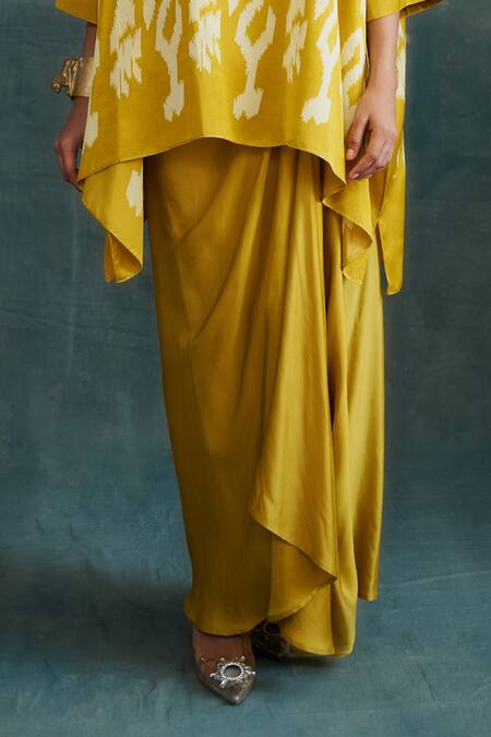 Krishna Mehta Yellow Modal Block Printed Ikat Boat Kaftan With Draped Skirt Online at Aza Fashions Krishna Mehta_Yellow Modal Block Printed Ikat Boat Kaftan With Draped Skirt _Online_at_Aza_Fashions