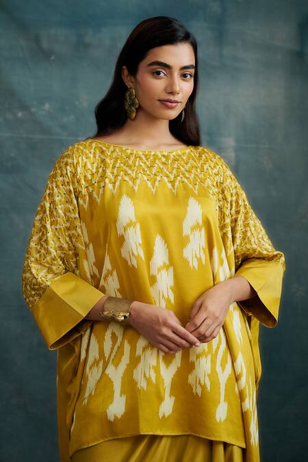 Buy Krishna Mehta Yellow Modal Block Printed Ikat Boat Kaftan With Draped Skirt Online at Aza Fashions Buy_Krishna Mehta_Yellow Modal Block Printed Ikat Boat Kaftan With Draped Skirt _Online_at_Aza_Fashions
