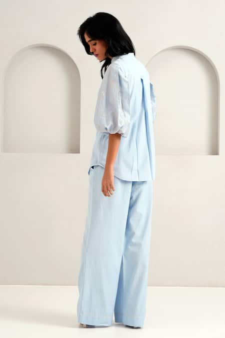 Shop Madder Much Blue Chanderi, Handloom Cotton Embroidery Oba Floral Top With Flared Pant at Aza Fashions Shop_Madder Much_Blue Chanderi, Handloom Cotton Embroidery Oba Floral Top With Flared Pant _at_Aza_Fashions