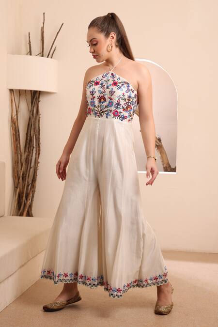 Shop_Ishram Couture_Ivory Handloom Cotton, Silk Embroidery, Mirrors Halter Kama Floral Jumpsuit _Online_at_Aza_Fashions