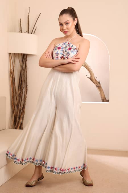Ishram Couture_Ivory Handloom Cotton, Silk Embroidery, Mirrors Halter Kama Floral Jumpsuit _at_Aza_Fashions