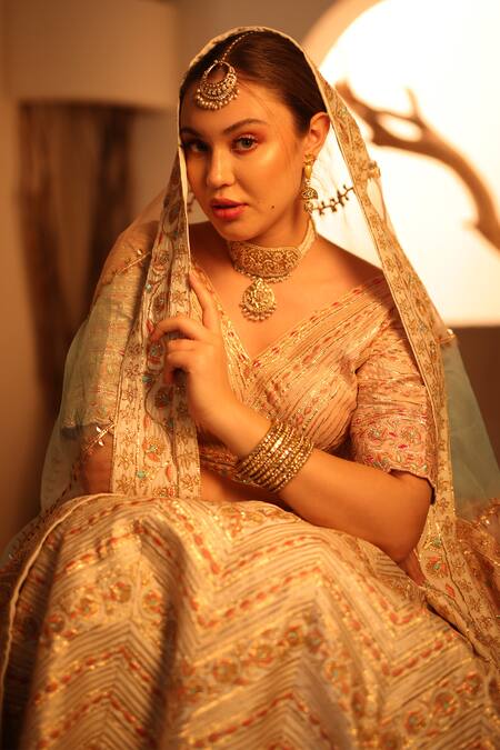 Ishram Couture_Ivory Silk Organza, Handloom Cotton Gota Patti, Moksh Floral Lehenga Set _at_Aza_Fashions