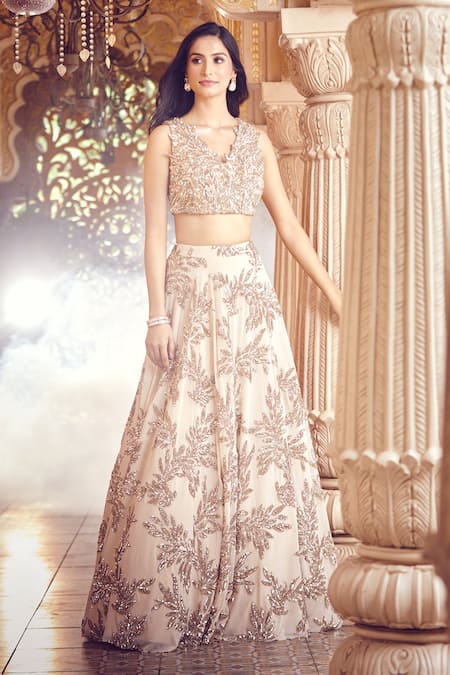 Shop Aariyana Couture Gold Net, Silk Sequins V-neck Tropical Embroidered Lehenga Set Online at Aza Fashions Shop_Aariyana Couture_Gold Net, Silk Sequins V-neck Tropical Embroidered Lehenga Set _Online_at_Aza_Fashions