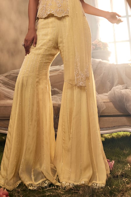 Sunita Bhandari Yellow Tulle, Viscose Sequins, Cut Work, Eclante Peplum Top Sharara Set Online at Aza Fashions Sunita Bhandari_Yellow Tulle, Viscose Sequins, Cut Work, Eclante Peplum Top Sharara Set _Online_at_Aza_Fashions