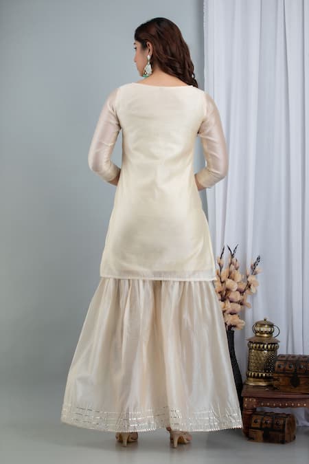 Shop Suti Kapda Off White Chanderi Embroidery, Gota Patti Round Hand Painted Kurta Sharara Set at Aza Fashions Shop_Suti Kapda_Off White Chanderi Embroidery, Gota Patti Round Hand Painted Kurta Sharara Set_at_Aza_Fashions