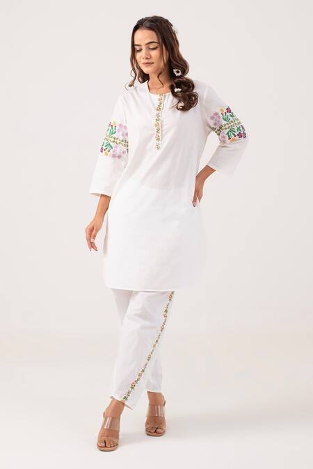 Shop Ekavira White Poplin Embroidery Floral Round Neck Reva Kurta With Pant at Aza Fashions Shop_Ekavira_White Poplin Embroidery Floral Round Neck Reva Kurta With Pant_at_Aza_Fashions