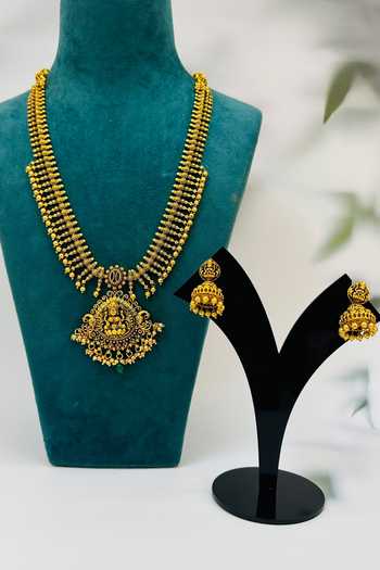 Shop Zaza By Somya Gold Plated Beads Cultural Opulence Carved Goddess Long Necklace Set at Aza Fashions Shop_Zaza By Somya_Gold Plated Beads Cultural Opulence Carved Goddess Long Necklace Set _at_Aza_Fashions